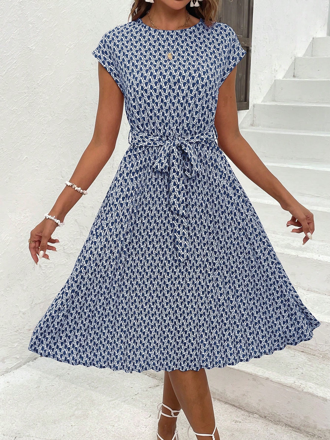 Elevate your style with our Chic and Elegant A-Line Summer Dress. With a round neck design, this dress exudes effortless style and provides a flattering A-line silhouette. Perfect for any summer occasion, elevate your wardrobe with this must-have piece.