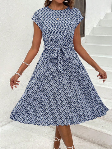 Elevate your style with our Chic and Elegant A-Line Summer Dress. With a round neck design, this dress exudes effortless style and provides a flattering A-line silhouette. Perfect for any summer occasion, elevate your wardrobe with this must-have piece.