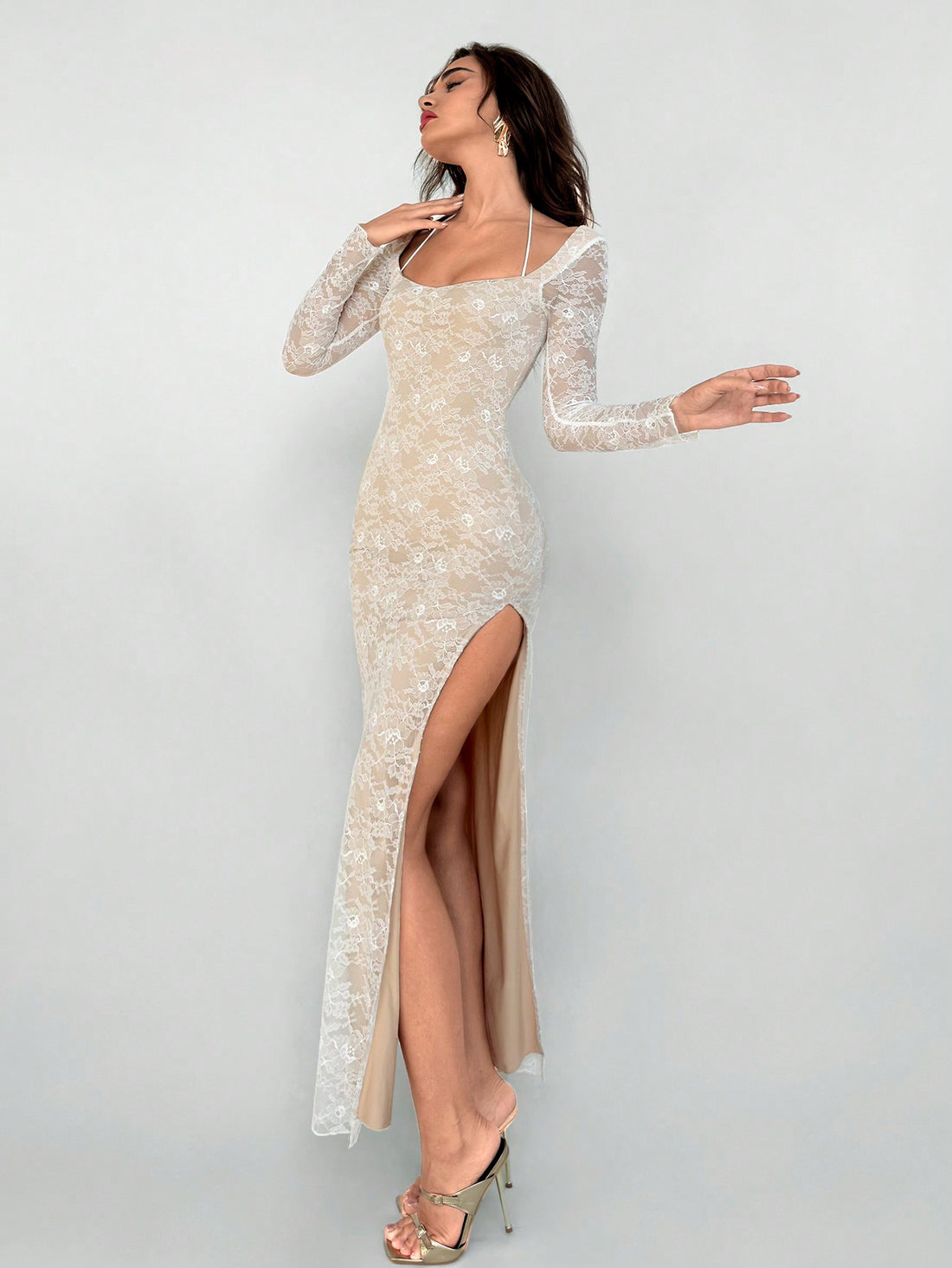 Elevate your style with our Chic and Elegant Fitted Lace Dress. Designed for Fall and Winter, this dress features a slimming fit, intricate lace detailing, and a flattering slit. Perfect for any occasion, this dress will make you look effortlessly chic and sophisticated.