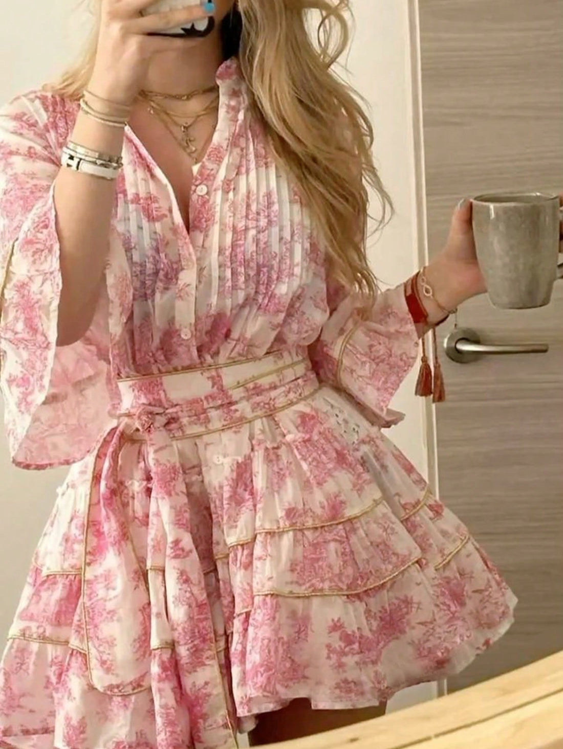 Escape to paradise in this enchanting printed button dress—your new vacation essential! Featuring a romantic print that whispers elegance and charm, this piece effortlessly transitions from beachside brunch to sunset strolls. The classic button-front design adds a touch of sophistication while keeping things breezy and comfortable. Perfect for those dreamy getaways where you want to look effortlessly chic without trying too hard. Pack light, travel far, and let this dress do all the talking.