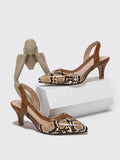 Indulge in luxury with our Chic and Serpent-Inspired Snakeskin Embossed Stiletto Heeled Slingback Pumps. These exquisite shoes combine fashion and functionality with its bold design and comfortable fit. Step out in elegance and make a statement with every step.