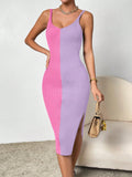 Add a touch of chic and sleek style to your wardrobe with our Color Block Side Slit Bodycon Sweater Dress! With a form-fitting design and unique color blocking, this dress is perfect for any occasion. The side slit and spaghetti strap add extra elegance to this must-have piece.