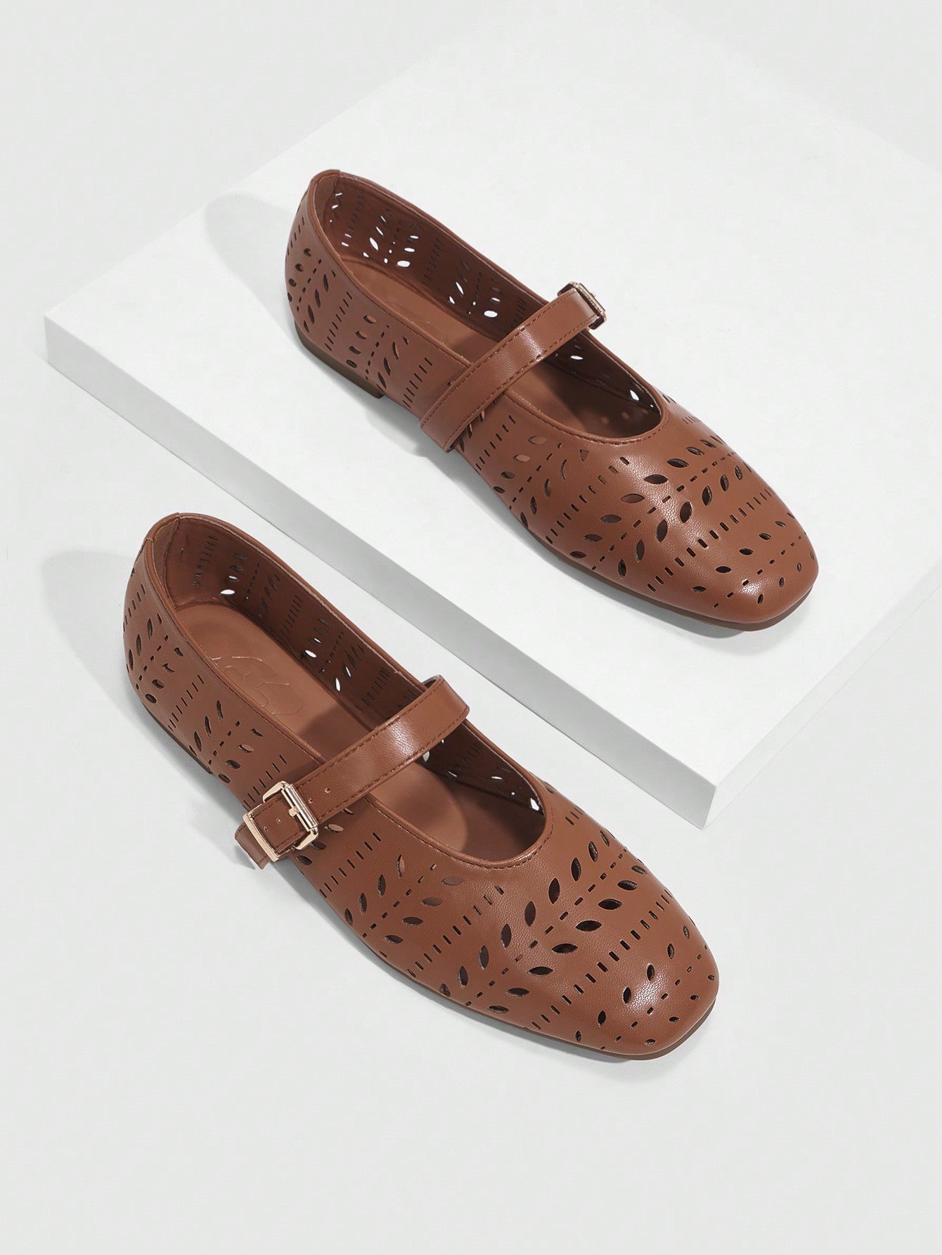 Elevate your style this summer with our Chic and Sophisticated Hollow-Out Flat Shoes. The intricate hollow-out design adds a touch of sophistication to any outfit. Stay comfortable all day with the flat sole. Perfect for any occasion, these shoes will elevate your style to the next level.