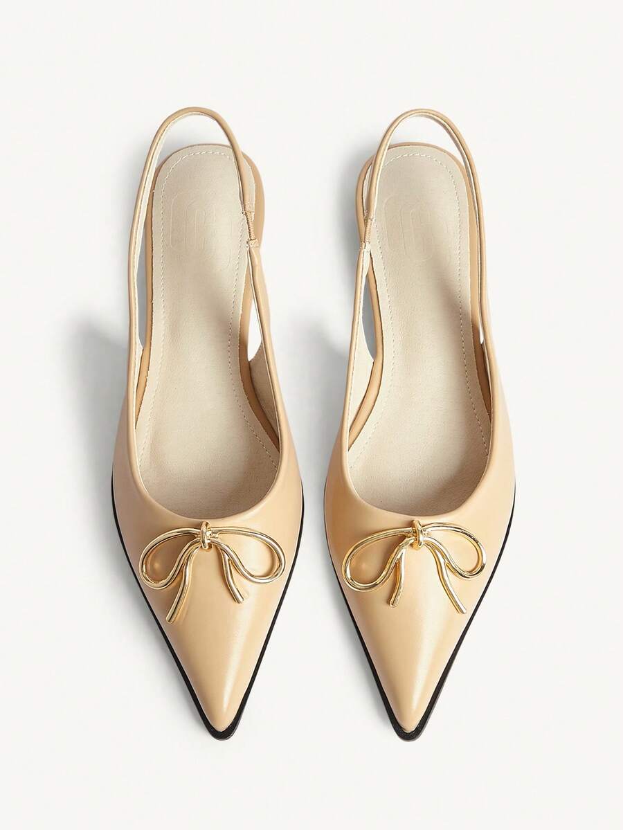 Elevate your everyday style with these sophisticated pointed-toe slip-on flats. Featuring a striking metal bow accent and delicate hollow-out detailing, they seamlessly transition from office to evening occasions. Crafted with premium PU leather upper and lining for comfort and durability, the flexible TPU sole ensures all-day wearability. Perfect for business casual, casual, or special events, these versatile apricot flats bring an elegant touch to any wardrobe.