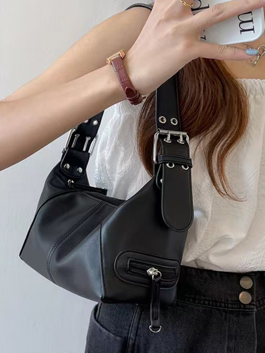 This versatile hobo bag for women is an ideal choice for the office, college, and travel. With its lightweight design, it is comfortable to carry around all day. The chic style adds a touch of sophistication to any outfit. Stay organized and fashionable with this must-have accessory.