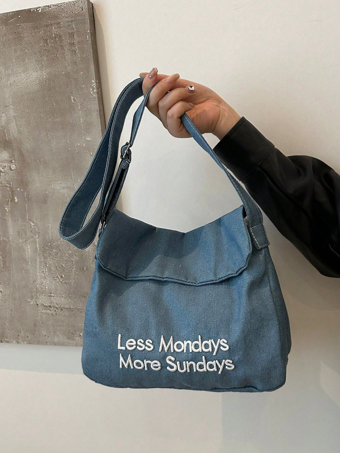 Elevate your office style with our chic and versatile crossbody bag. Made with solid colors and detailed with elegant letter embroidery, this bag exudes professionalism and trendiness. Stay organized with multiple compartments and elevate your look with this stylish accessory.