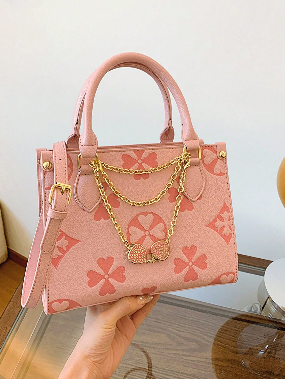 Expertly designed for fashionistas, this hand-held shoulder bag is both chic and versatile. Its sleek design and high-quality materials make it the ultimate accessory for any outfit. With its spacious interior and sturdy construction, it is the perfect blend of style and functionality.
