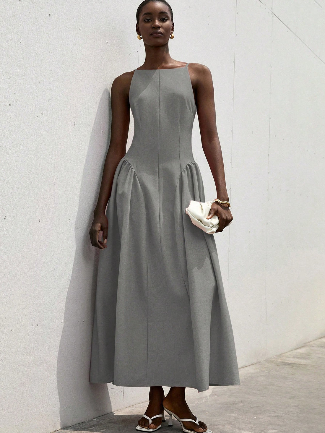 Step into the spotlight with this playful chiffon high-low dress, designed to turn heads at any year-end celebration. Its off-shoulder style and elegant ruching add a flirty touch, while the flowing high-low hem creates a fun, dynamic silhouette. Perfect for dancing the night away or making a graceful entrance, this dress combines comfort and charm effortlessly.