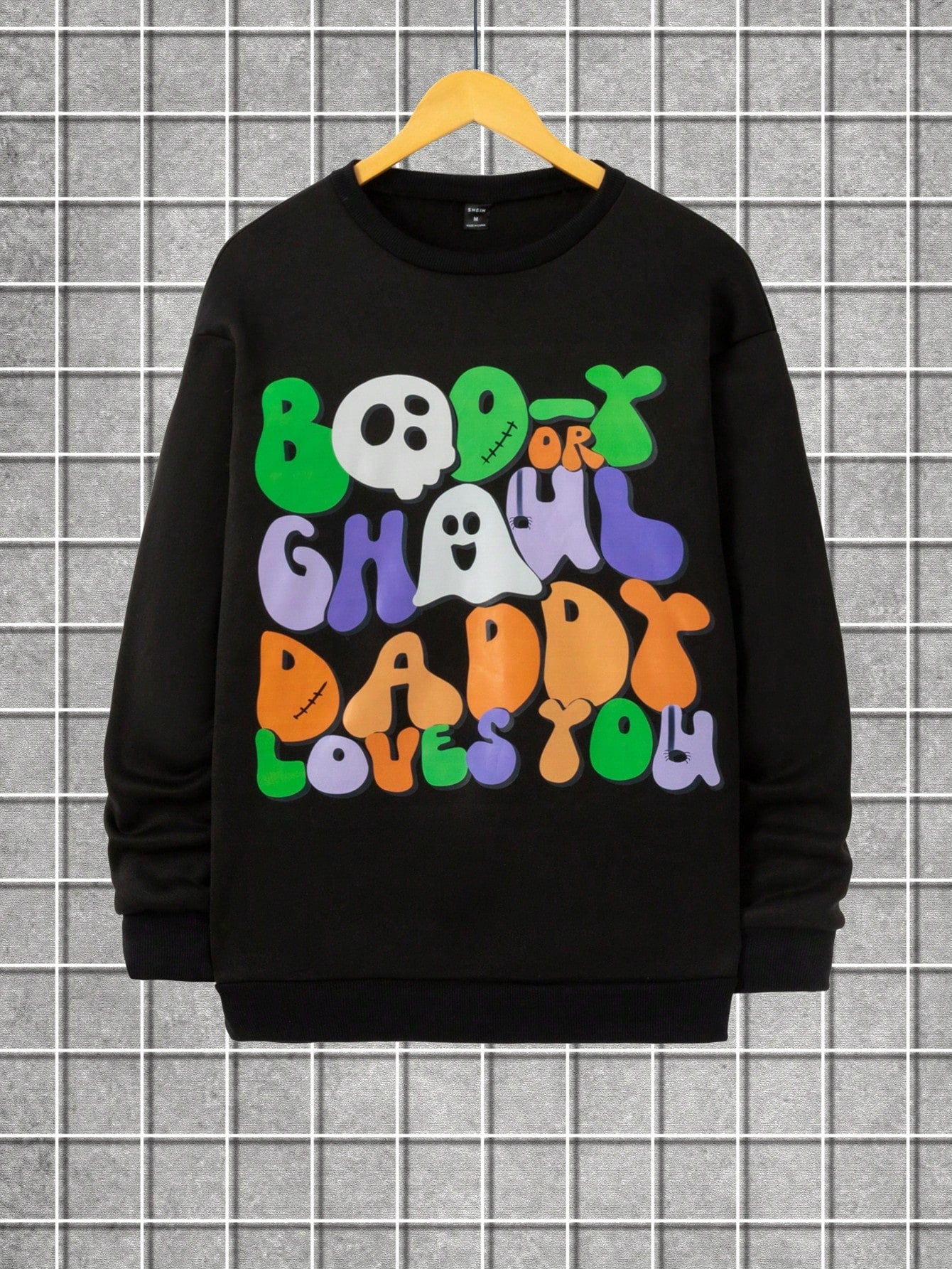 Get ready to rock the haunted house with our Chilling Comfort pullover sweatshirt! Featuring a spooky yet stylish skull and ghost graphic, this sweatshirt will keep you comfy and creepy all Halloween season. Perfect for any casual occasion (or possession). Boo-ya!