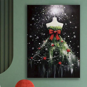 Portrait Christmas canvas print with green tree dress, red bow, ornaments and snow on a black background, styled on a sage wall