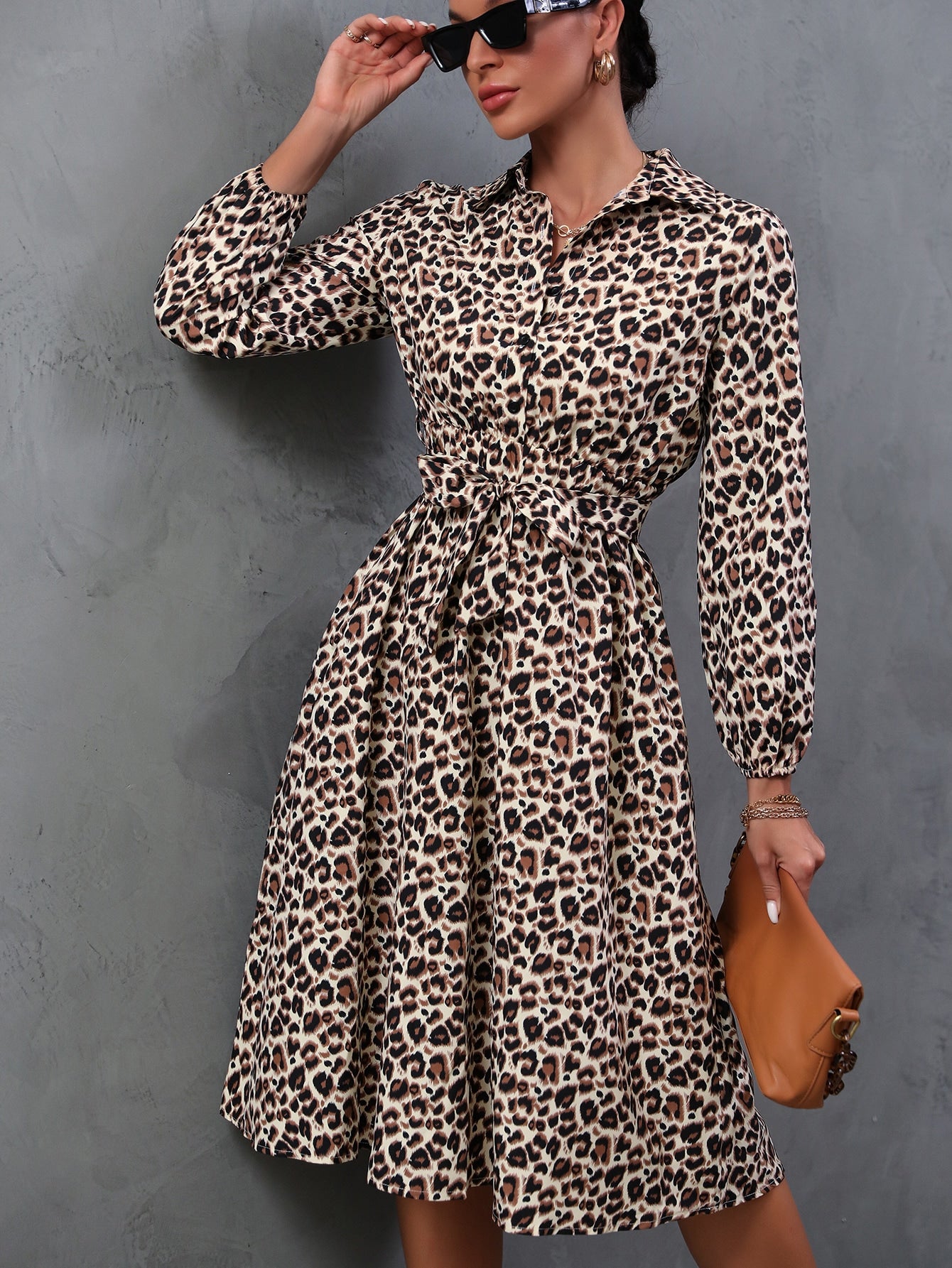 Let out your wild side with our Clasi Leopard Print Belted Maxi Shirt Dress! This stylish and chic outfit is perfect for any occasion and features a flattering belted waist to enhance your figure. With its unique leopard print and maxi length, you'll be the center of attention wherever you go. Rawr!