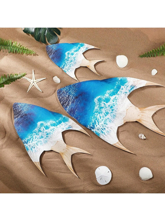 Elevate your poolside and terrace decor with Coastal Charm's 3-piece blue wooden fish wall art. These handcrafted pieces bring a touch of coastal charm to any outdoor space. Made with high-quality materials, these fish will add a pop of color and personality to your home.