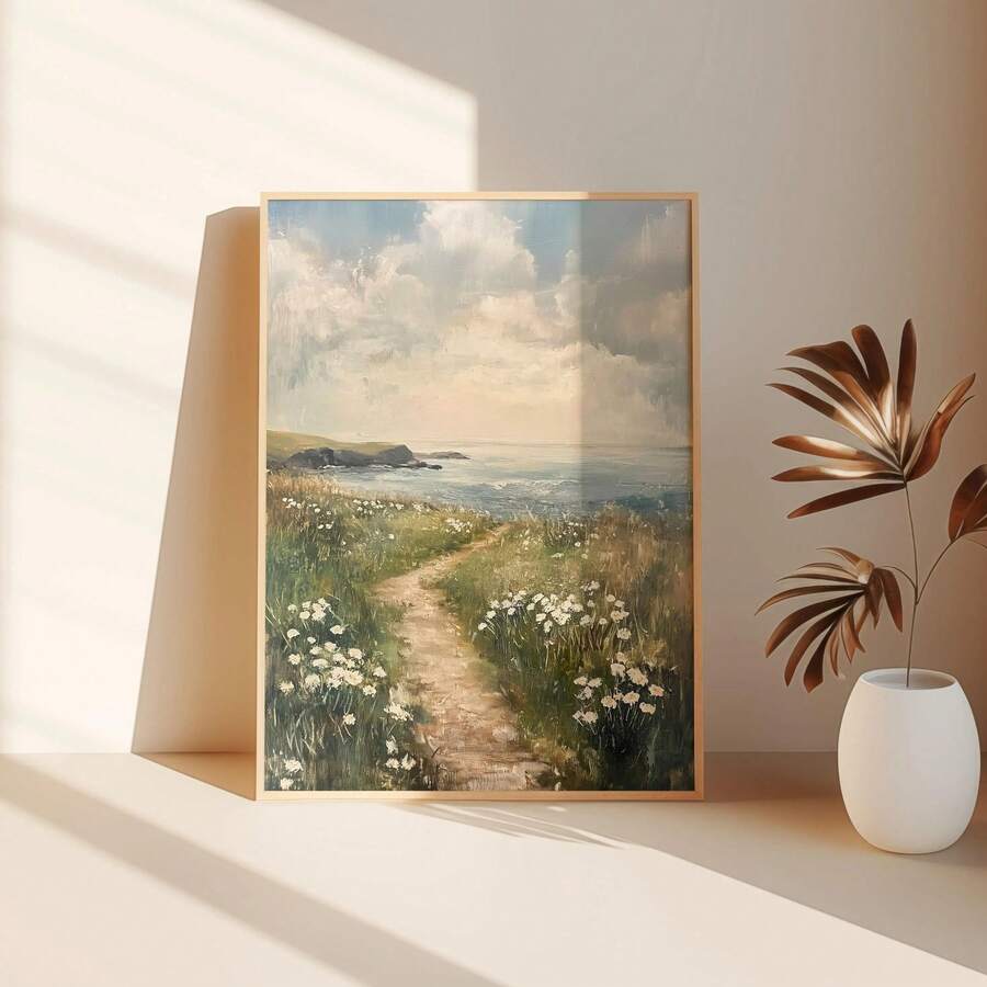 Shelf view of coastal wildflower canvas wall art with ocean path and light wood frame mockup