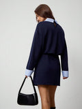 Rear three-quarter view of royal blue contrast collar mini dress with keyhole detail