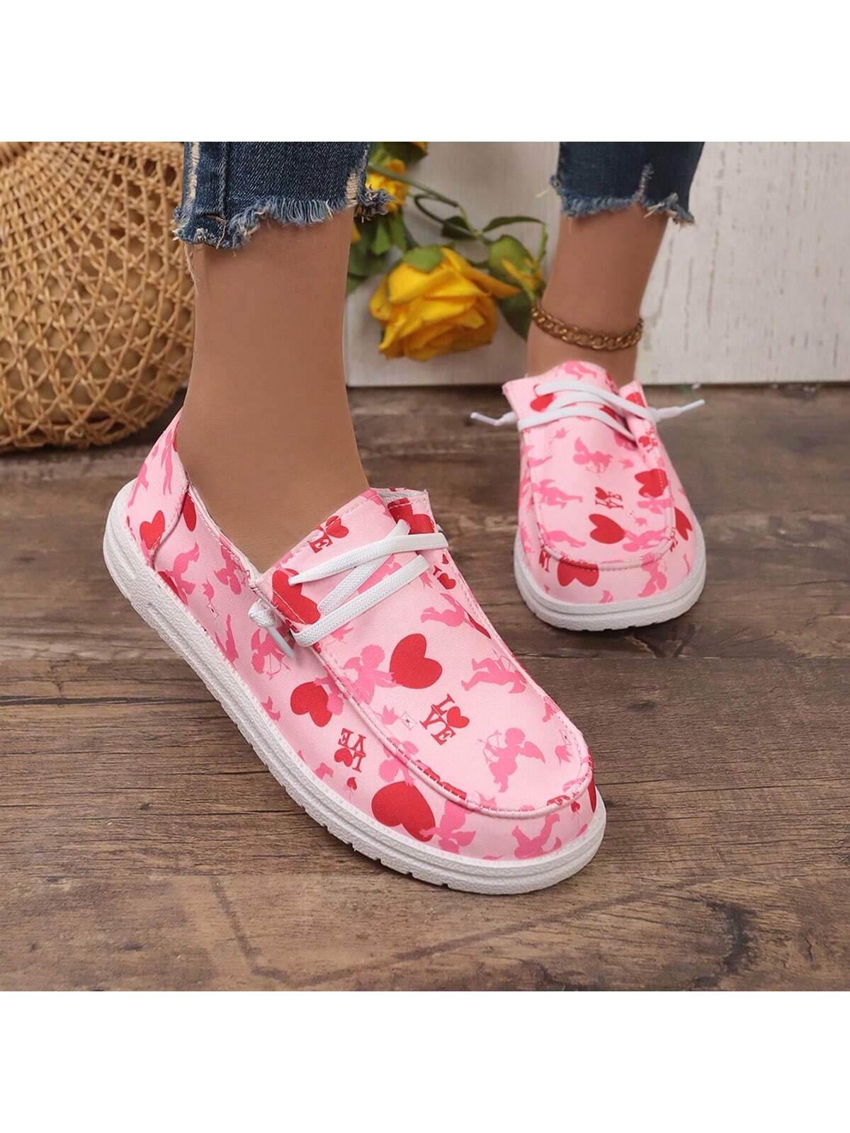 Step up your fashion game with these Color Heart & Cartoon Graphic Print Fashionable Versatile Casual Sneakers for Women, perfect for Valentine's Day! These versatile sneakers feature a playful heart and cartoon graphic design, adding a touch of whimsy to any outfit. Rock these trendy sneakers and spread the love everywhere you go!