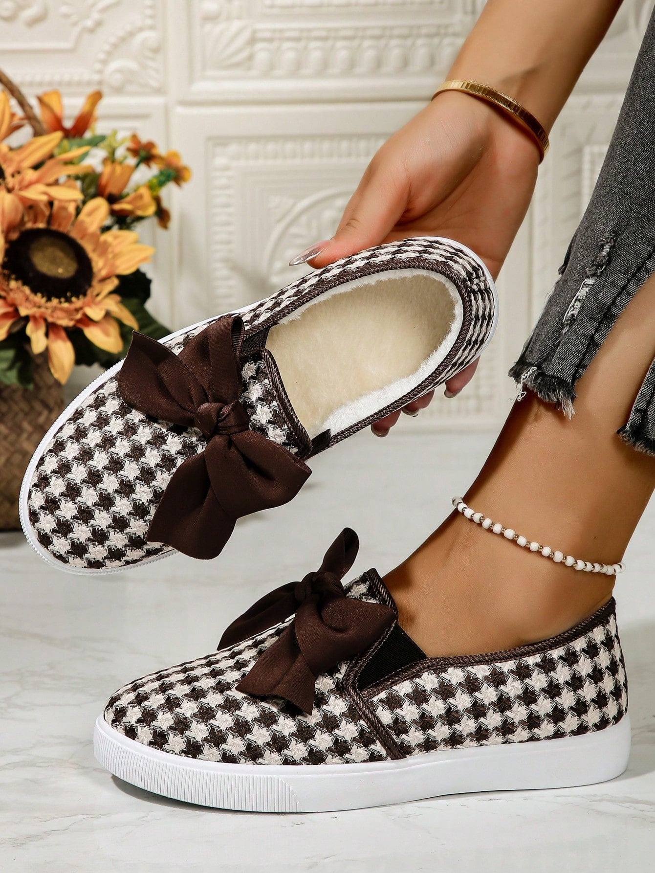 Step up your style game with our Colorblock Bow Tie Fleece-Lined Sneakers. Featuring a trendy colorblock design and a comfortable fleece lining, these sneakers will keep you looking and feeling cozy outdoors. Stay warm and stylish with these must-have shoes.