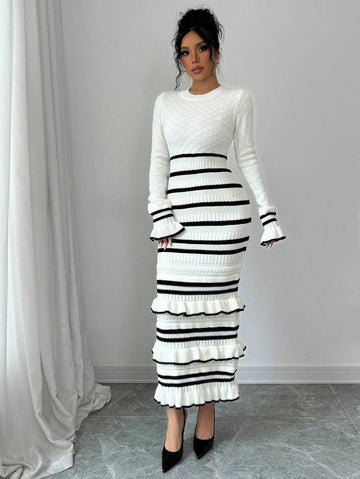 Black and white striped knit midi sweater dress with tiered ruffle hem, front view