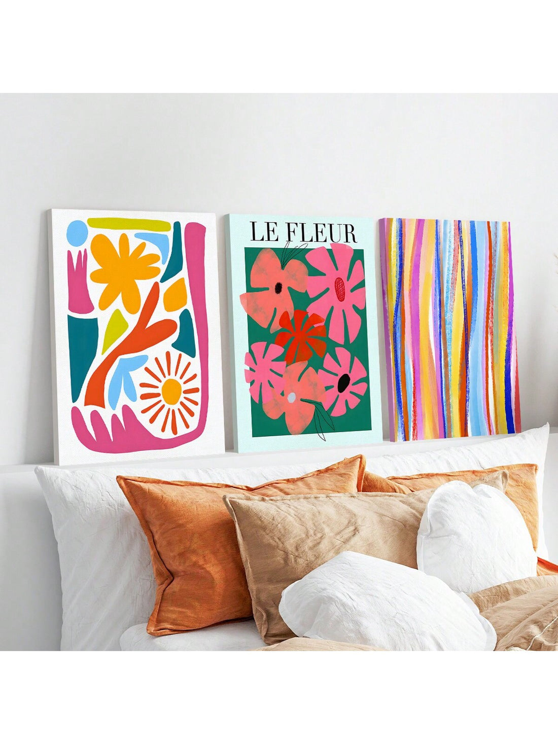 Transform your walls into a gallery of modern creativity with this vibrant 3-piece abstract canvas set. Each piece features bold, eye-catching colors and minimalist designs that spark conversation and inspire imagination. Perfect for living rooms, bedrooms, offices, or any space craving personality, this collection brings contemporary flair without overwhelming your décor. Whether you're decorating your own sanctuary or searching for a thoughtful gift for the art lover in your life, these canvases deliver i