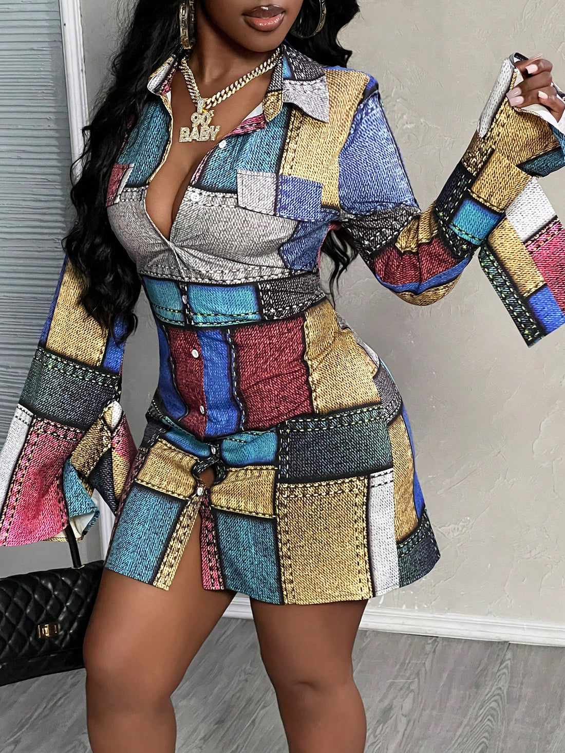 Stylishly chic, this Colorful Chic button-up mini dress is a must-have for any woman's wardrobe. Featuring a unique patchwork design, this dress will turn heads and make a statement. Made with high-quality materials, it offers both comfort and style. Perfect for any occasion, this dress is sure to become your new favorite.