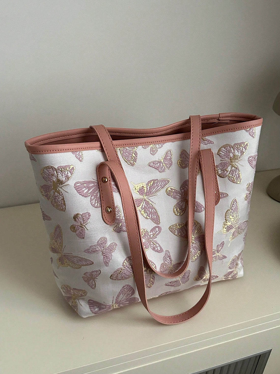 Make a statement with the Colorful Embroidered Bow Handbag - the ultimate fashion accessory for women on-the-go! With its vibrant colors and intricate embroidery, this handbag is perfect for adding a touch of style to any outfit. Stay organized with its spacious interior and be the envy of everyone with this eye-catching bag.
