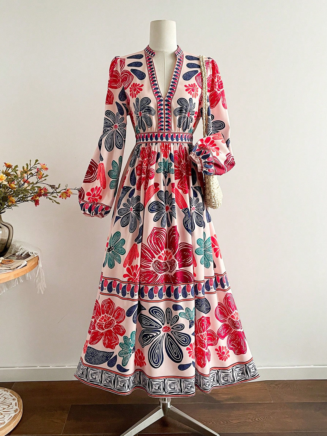 Embrace your free-spirited style with this vibrant floral bohemian dress! Featuring a stunning array of colors and intricate patterns, this long-sleeve beauty transitions seamlessly from fall into winter. The relaxed, flowing silhouette offers all-day comfort while the rich botanical prints add an artistic flair to your wardrobe. Perfect for layering with boots and a cozy cardigan, this dress celebrates individuality and effortless elegance. Whether you're heading to brunch or a casual gathering, this boho 