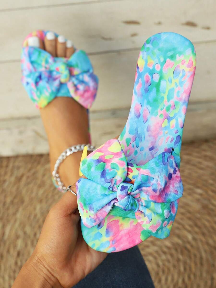 Step into summer fun with these Colorful Floral Flat Sandals, featuring charming butterfly accents that add a whimsical touch. Perfect for beach weddings or casual outings, their bohemian chic style brings vibrant flair to any outfit while keeping your feet comfy all day long. Let your toes dance in style and color wherever you go!