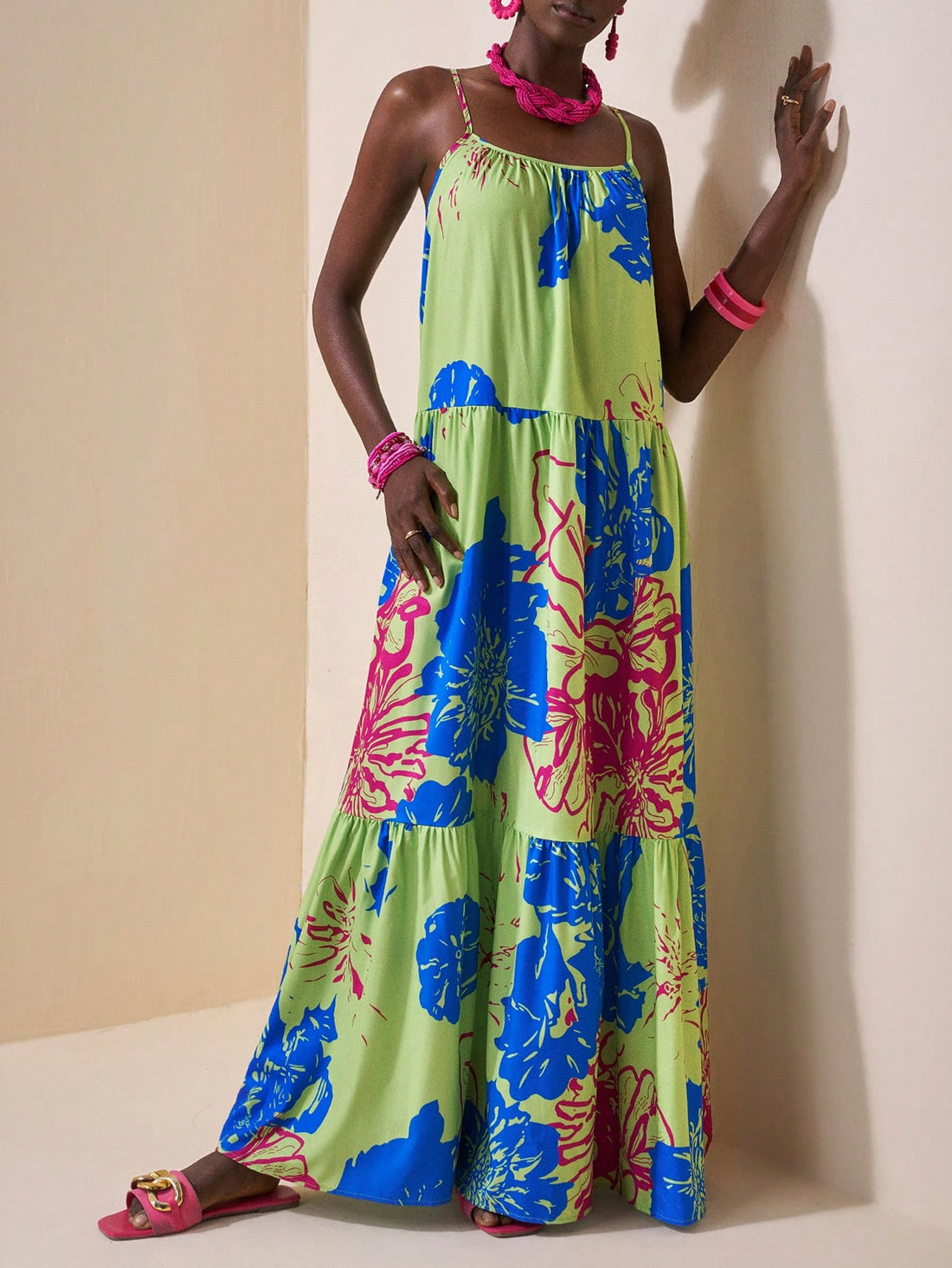 Add some fun and flair to your spring/summer wardrobe with our Colorful Floral Print Maxi Dress for Women. This swing style dress features a trendy suspender U-neck, adding a playful touch to the flowy floral design. Perfect for any occasion, this dress is sure to turn heads and put a smile on your face!