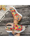 Step into vibrant style with these Colorful Graffiti Wedge Sandals, designed for women who love bold, artistic flair. Featuring adjustable slip-on canvas construction, these high heels combine comfort with eye-catching graffiti patterns that make a statement at the beach or summer gatherings. The woven detail adds texture and visual interest, while the wedge heel provides stable, all-day support without sacrificing height. 