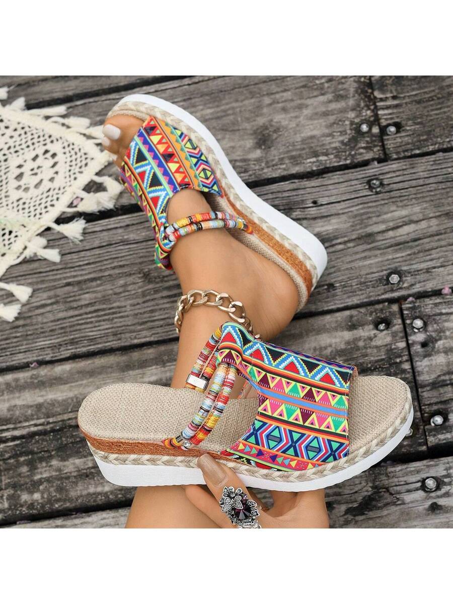 Step into summer fun with these Colorful Graffiti Wedge Sandals! Featuring a vibrant slip-on design and high heel platform, they combine style and comfort effortlessly. The woven details add a unique touch, making them perfect for beach trips or casual outings. Elevate your look with a playful pop of color and easygoing charm.
