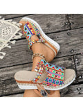 Step into summer fun with these Colorful Graffiti Wedge Sandals! Featuring a vibrant slip-on design and high heel platform, they combine style and comfort effortlessly. The woven details add a unique touch, making them perfect for beach trips or casual outings. Elevate your look with a playful pop of color and easygoing charm.