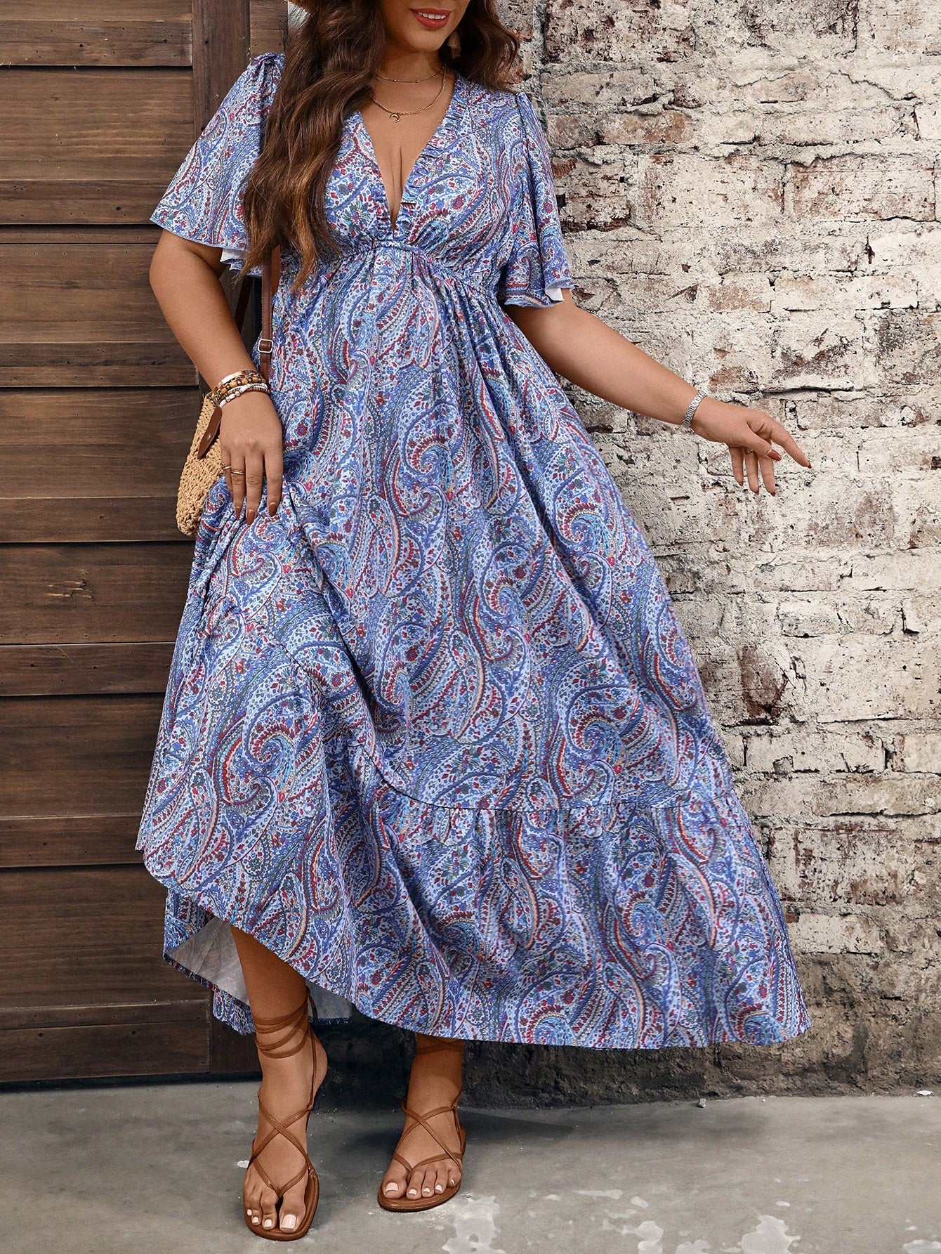 Embrace your free spirit in this vibrant plus-size boho dress! The playful ruffle sleeves add a flirty touch, while the retro paisley print brings all the fun vintage vibes. Perfect for festival season, summer adventures, or whenever you want to turn heads and feel fabulous. Dance, twirl, and shine in this colorful statement piece designed to celebrate your curves!