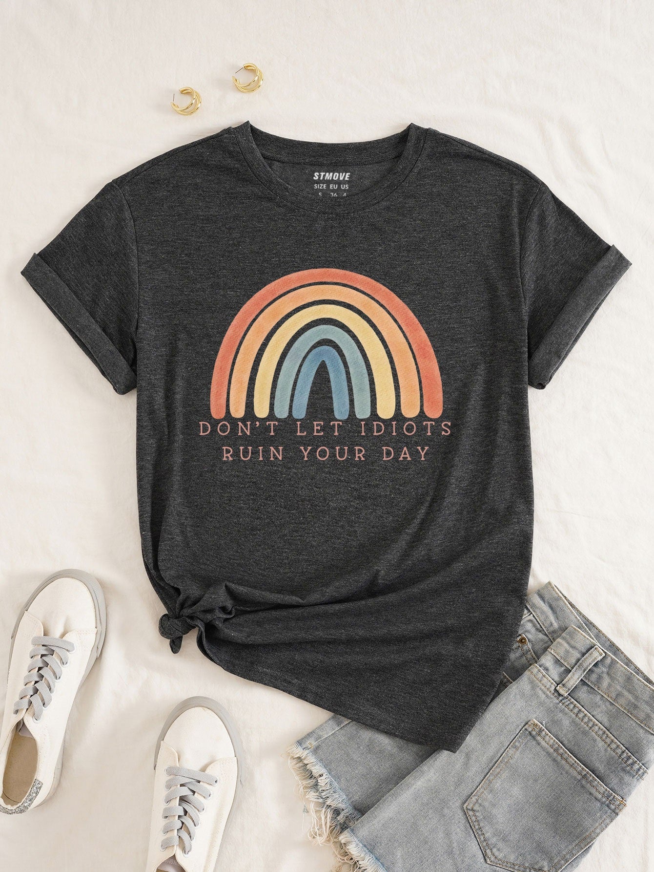 Spread some colorful positivity with this 'Don’t Let Ruin Your Day' tee! Featuring a vibrant graphic and playful message, this tee will remind you to stay positive and not let anything ruin your day. Stay stylish and positive with this quirky tee.