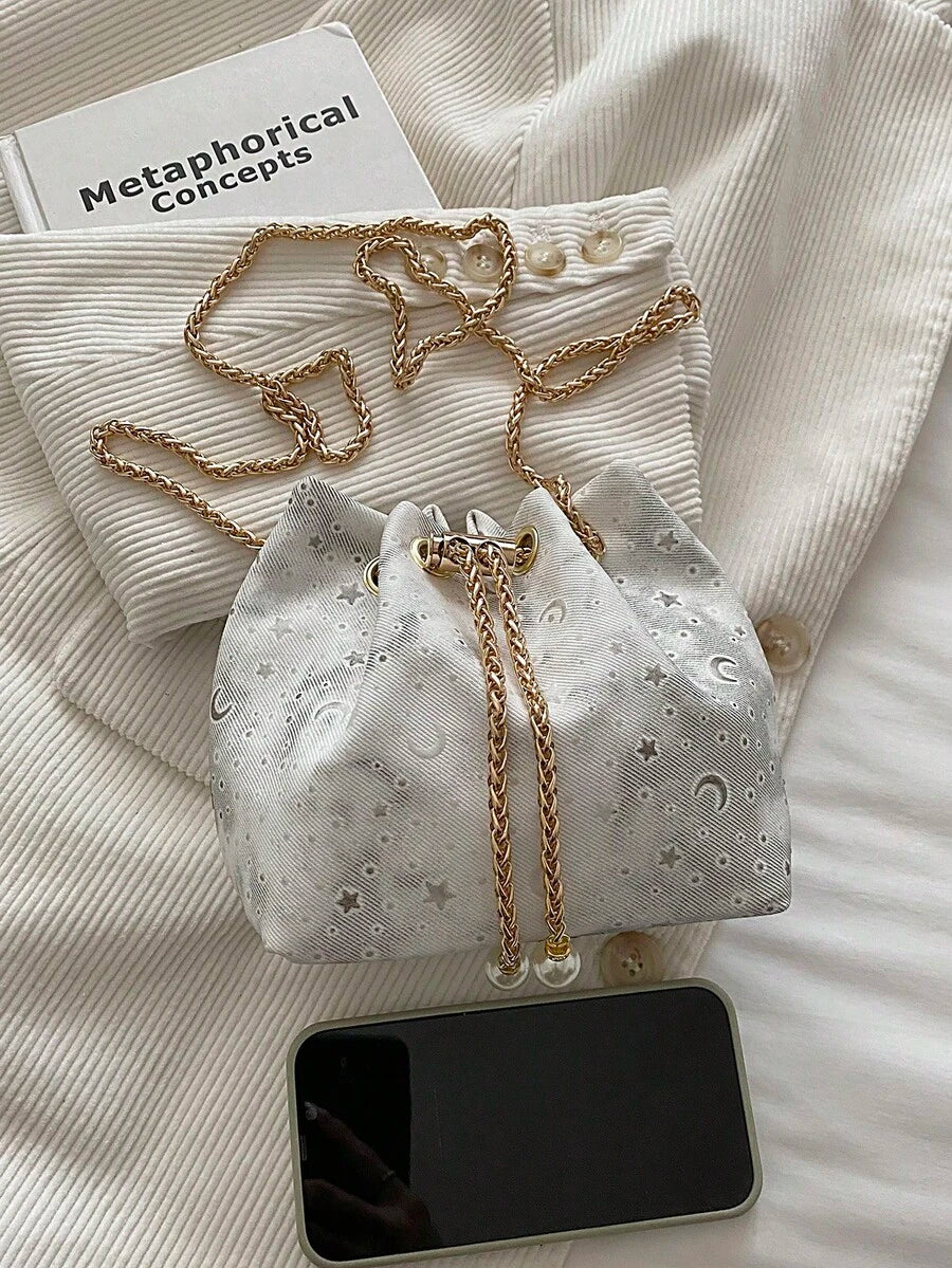 Elevate your evening look with this stunning sequin bucket bag, designed to turn heads at any celebration. The vibrant, colorful sequins catch the light beautifully, creating a dazzling effect that pairs perfectly with cocktail dresses and formal wear. Featuring a secure chain drawstring closure, this bag keeps your essentials safe while maintaining an elegant silhouette. The bucket shape offers surprising capacity—hold your phone, lipstick, keys, and more without sacrificing style. 