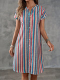 Get ready for some summer fun in our Colorful Striped Notched Neck Summer Dress! With a button front and playful, colorful stripes, this dress is perfect for casual holidays. Stay comfortable and stylish all season long in this must-have dress!