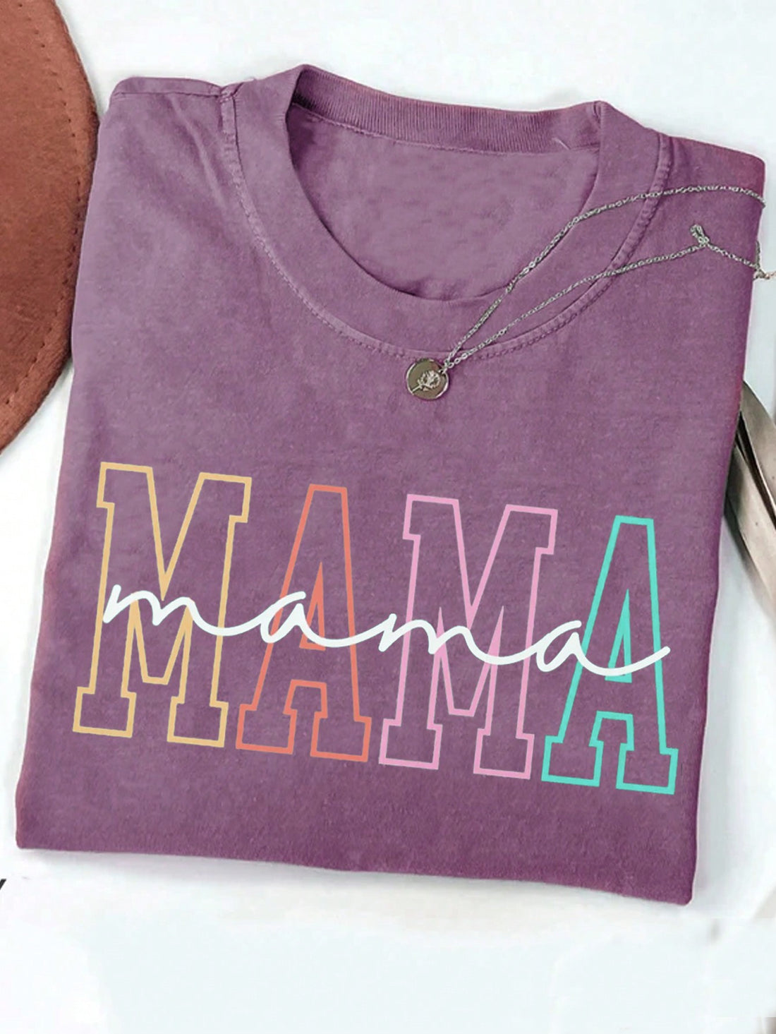 Show your love for mom with this Comfort Colors 'Mom' T-Shirt. The perfect gift for Mother's Day, birthdays, or any occasion to show appreciation. Made with comfort and style in mind, it's sure to become her new favorite shirt. Get yours today and make mom feel special!