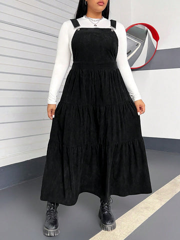 Unleash your style with our Comfortable Plus Size Long Overall Dress! Featuring a flowy ruffle hem, this dress adds a touch of fun and ease to your outfit. Perfect for all women, this dress offers both comfort and style. Get ready to make a statement!