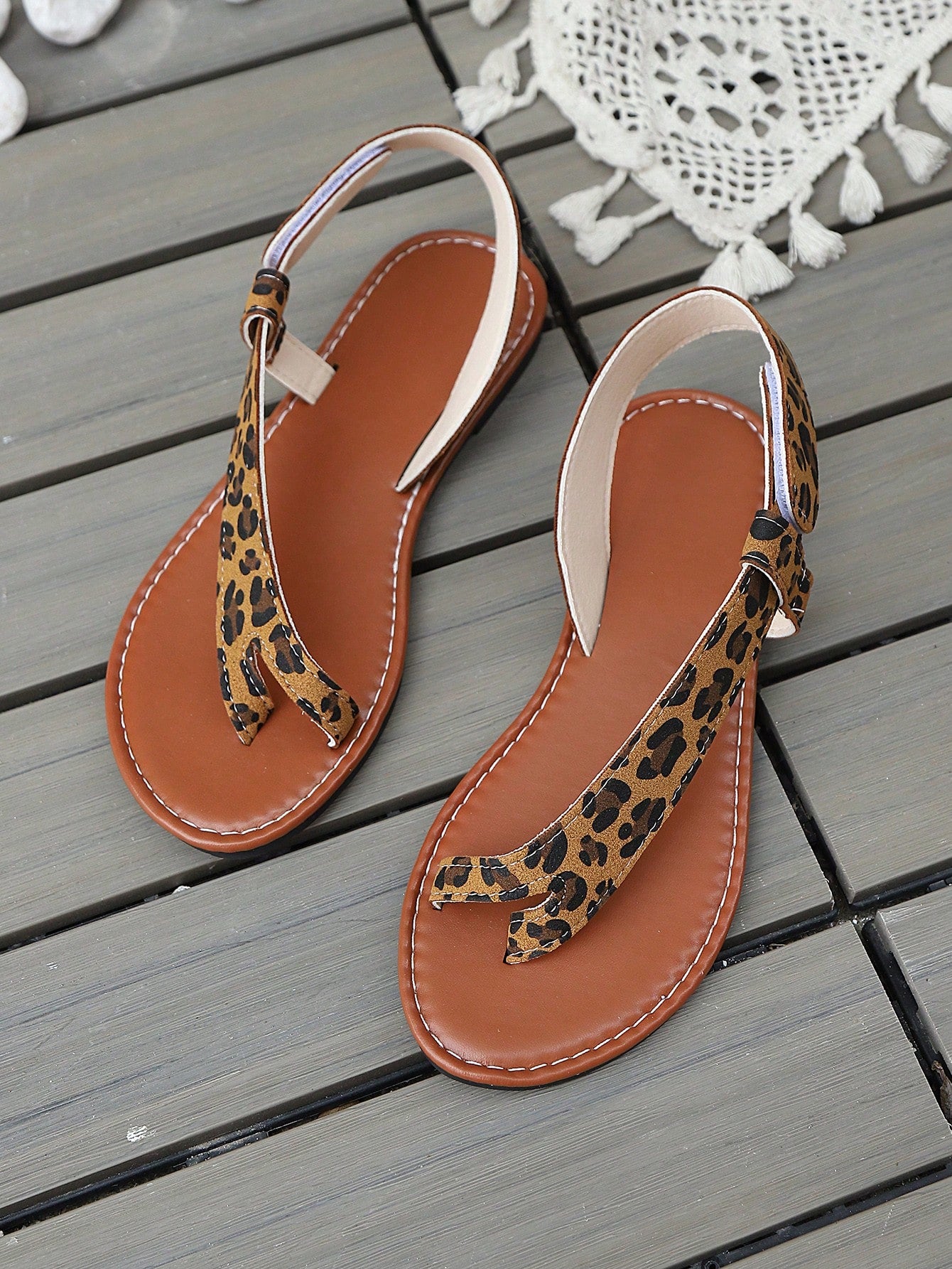 Step into sunny days with these playful and elegant women's toe thong sandals. Perfect for casual beach strolls or everyday wear, they combine comfort with style effortlessly. Lightweight and easy to slip on, they keep your feet cool and happy while adding a touch of charm to any outfit. Whether you're chasing waves or running errands, these sandals are your go-to for fun, relaxed vibes all day long.