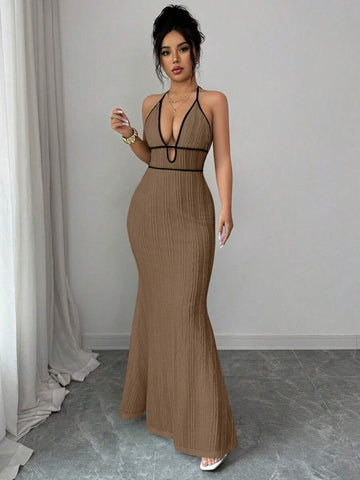 Elevate your everyday style with this contrast trim bodycon knit dress, designed to create a sleek, flattering silhouette for any occasion. Featuring delicate spaghetti straps, eye-catching contrast trim, and a figure-hugging mini length, this dress combines modern elegance with all-day comfort.