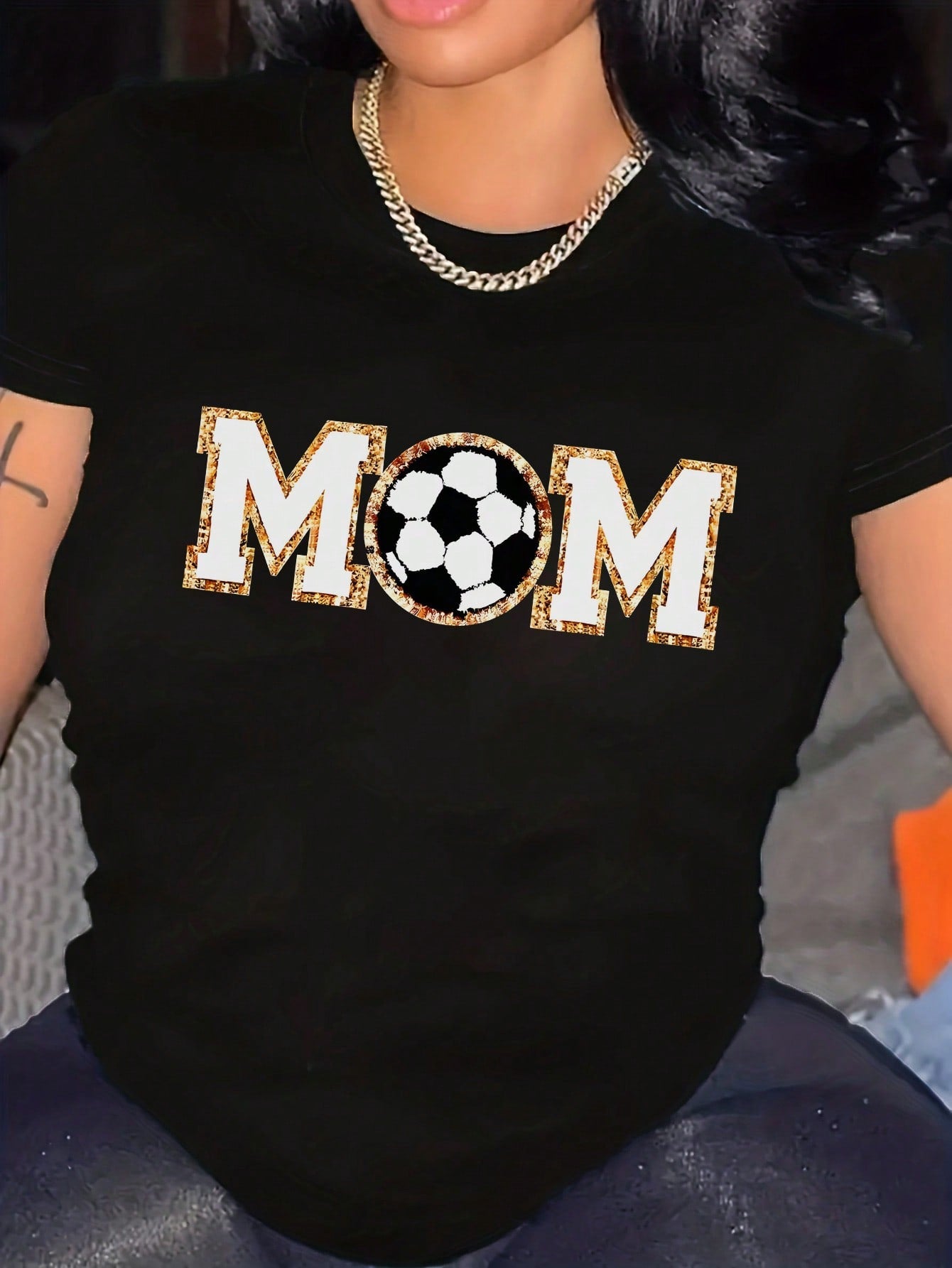 This cool and casual 'Soccer Mom' graphic tee is perfect for those hot summer days on the sidelines. With a playful design and comfortable fit, you'll be the envy of all the other moms. Show off your quirky sense of humor and love for the game with this fun and stylish shirt!