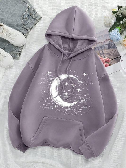 Introducing Cosmic Comfort: Women's Star & Moon Pattern Hoodie. With its unique celestial design, this hoodie will add a touch of cosmic style to your wardrobe. Made with comfort in mind, it's perfect for lounging or casual outings. Stay cozy and stylish in this must-have piece.