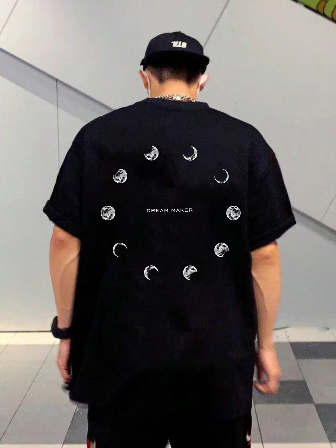 Get in touch with the cosmos in our Cosmic Vibes tee. Featuring a drop shoulder design and a unique moon print, this tee is perfect for those who want to add some quirky fun to their wardrobe. Embrace your lunar side and make a statement with Cosmic Vibes!