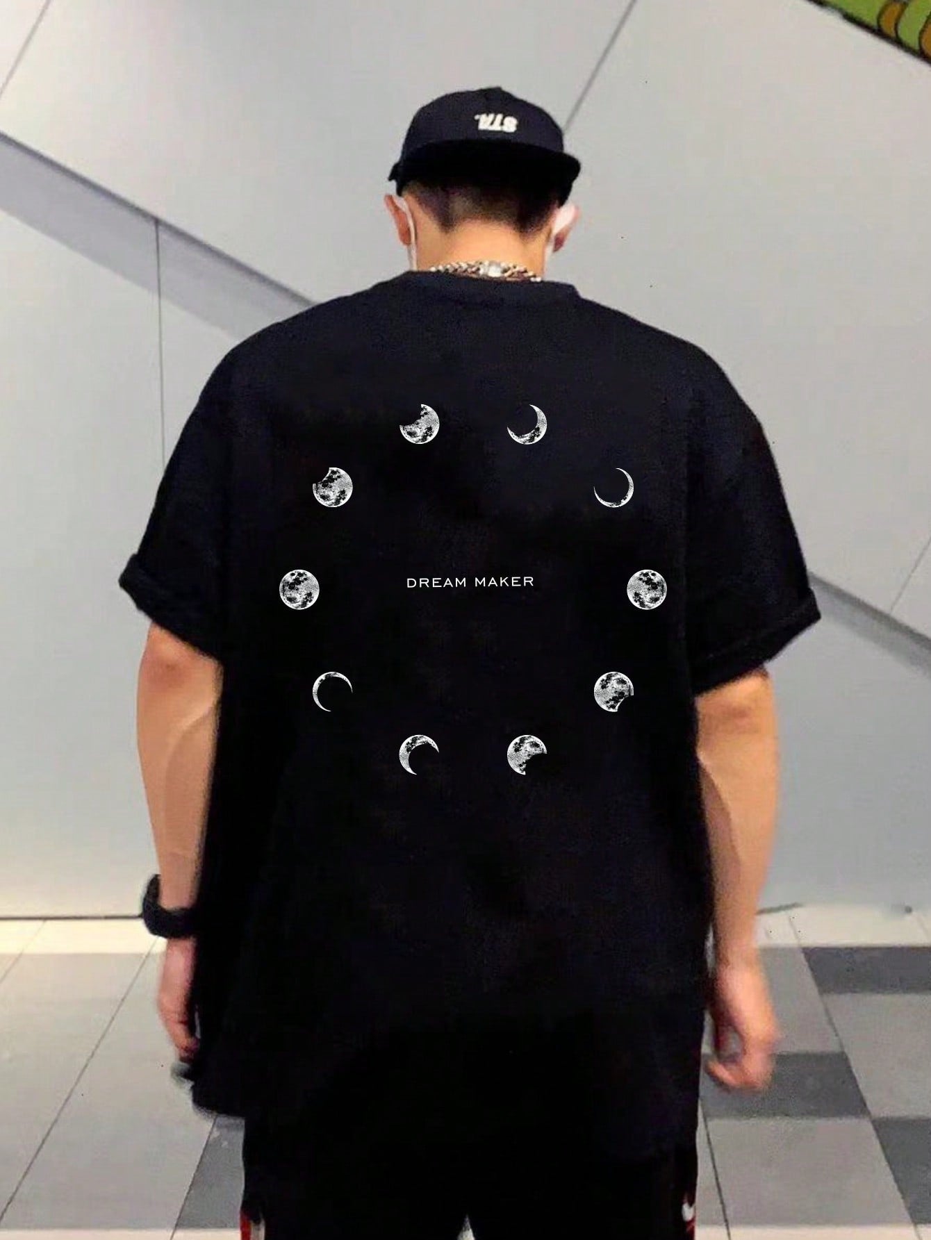 Get in touch with the cosmos in our Cosmic Vibes tee. Featuring a drop shoulder design and a unique moon print, this tee is perfect for those who want to add some quirky fun to their wardrobe. Embrace your lunar side and make a statement with Cosmic Vibes!
