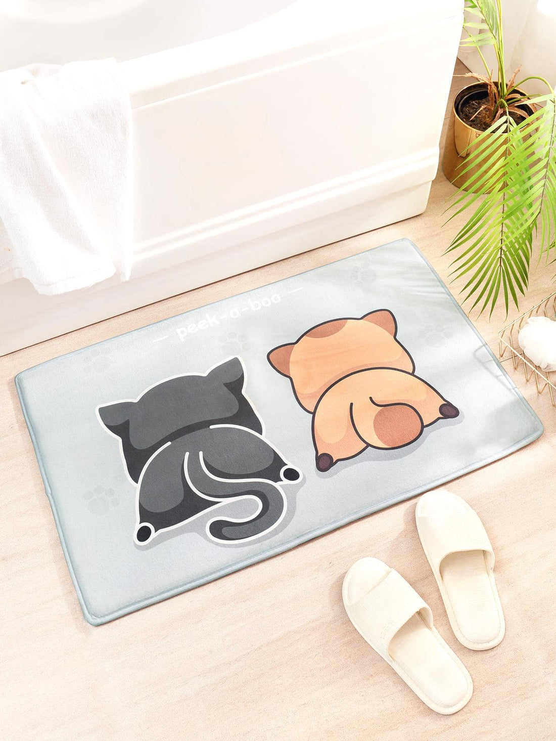 Introducing the Cozy Cartoon Cat Flannel Bath Mat, the perfect addition to your bathroom. Made from soft and absorbent flannel, this mat will keep your feet warm and dry while also providing a non-slip surface for safety. With a cute cartoon cat design, it's both functional and adorable.