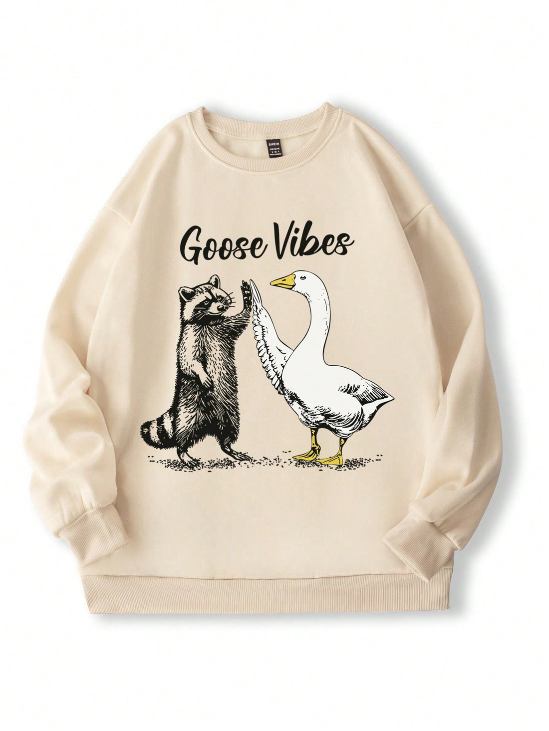 Introducing our Cozy Casual Raccoon & Goose Print Round Neck Sweatshirt for Autumn & Winter. Stay warm while showing off your playful side with this quirky sweatshirt featuring a cute raccoon and goose print. Perfect for those chilly days, it's a must-have addition to your wardrobe.