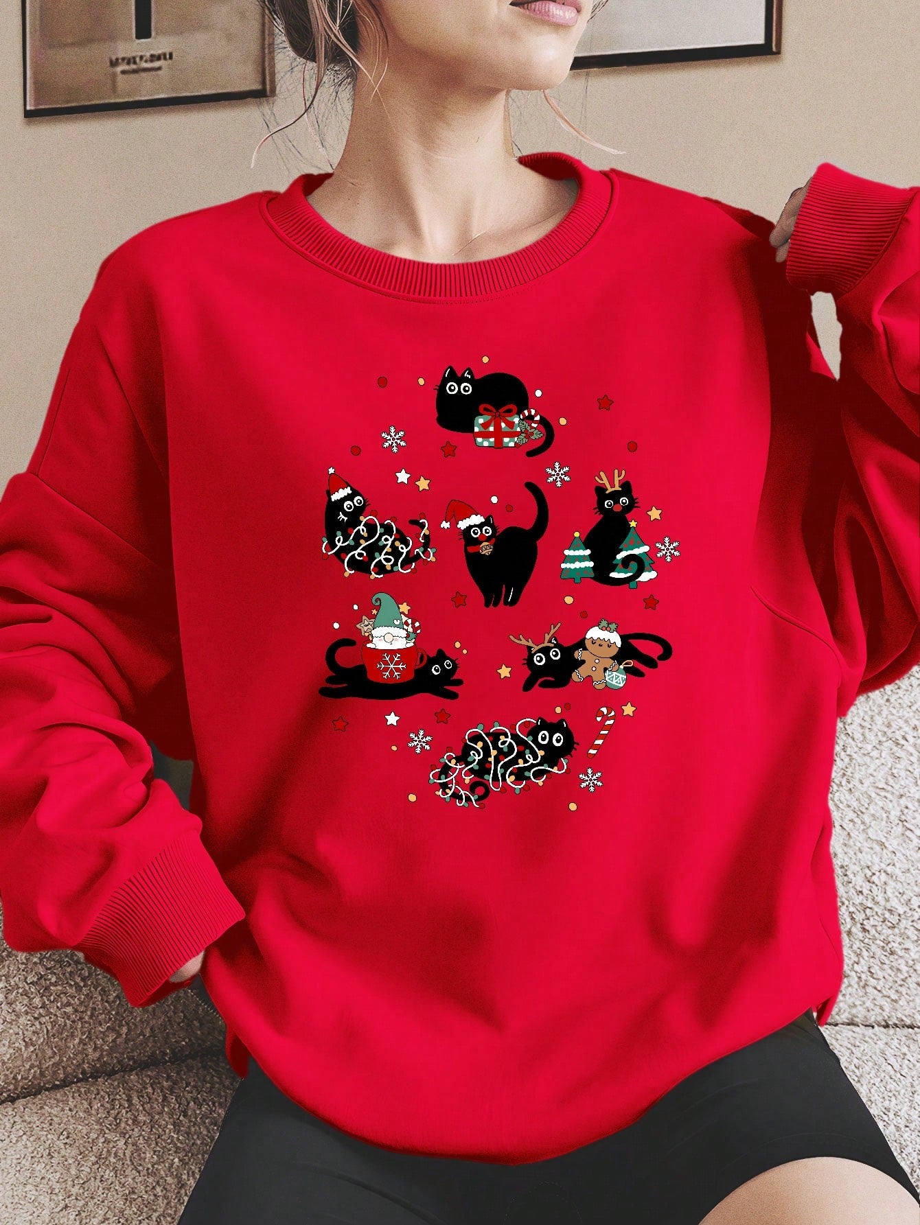 Stay cozy and stylish this autumn and winter with our Cozy Cat Graphic Hoodie. Made from high-quality fabric, this sweatshirt features a minimalist design and a cute cat graphic. Perfect for casual outings or lounging at home. Embrace comfort and fashion with our Cozy Cat Graphic Hoodie.