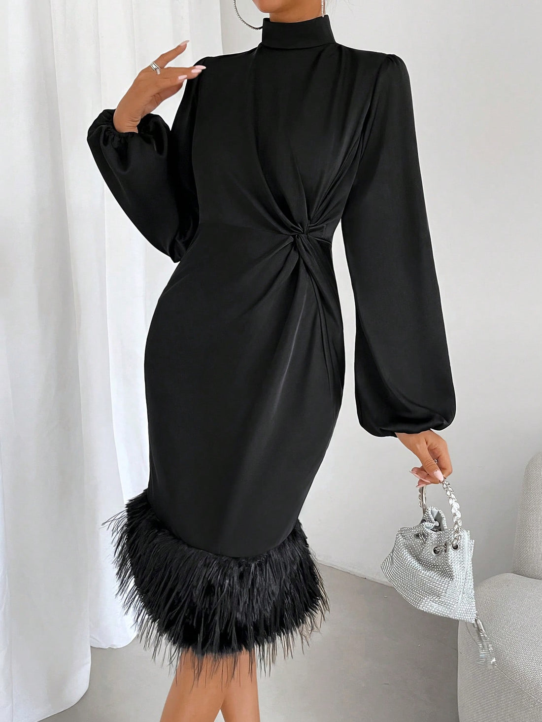 The Cozy Chic dress boasts a unique twist front design and stylish lantern sleeves with fuzzy trim. Made with the utmost comfort in mind, this dress is perfect for any occasion and is sure to keep you chic and cozy all day long.