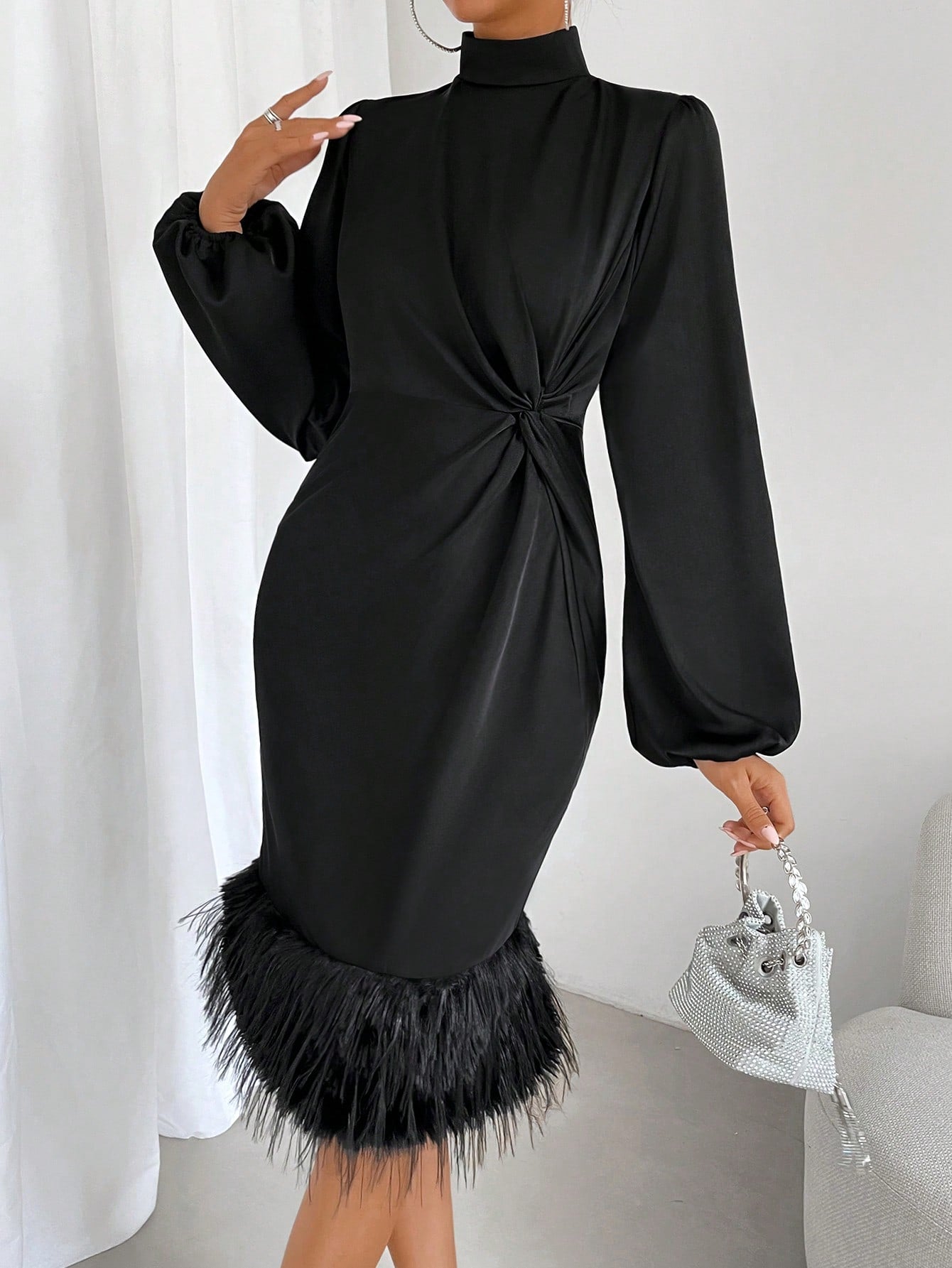 The Cozy Chic dress boasts a unique twist front design and stylish lantern sleeves with fuzzy trim. Made with the utmost comfort in mind, this dress is perfect for any occasion and is sure to keep you chic and cozy all day long.