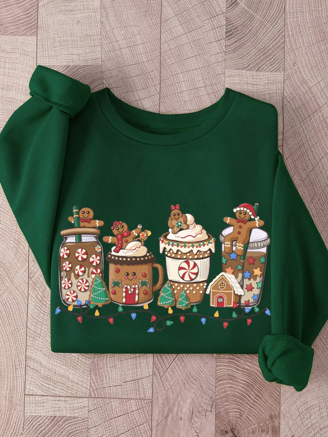 Wrap yourself in holiday cheer with this delightfully cozy gingerbread man sweatshirt! Featuring a charming printed design that brings festive flair to your everyday wardrobe, this thermal-lined long sleeve top is your new cold-weather essential. Perfect for autumn and winter adventures, the soft lining keeps you toasty warm while the relaxed fit ensures all-day comfort. Whether you're sipping hot cocoa, decorating the tree, or just spreading seasonal joy, this playful sweatshirt adds a touch of whimsy to y