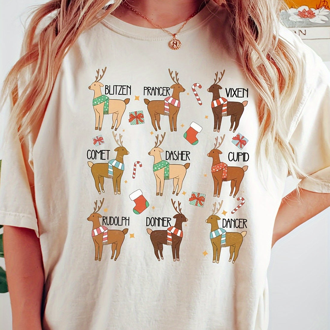 This Cozy Christmas Reindeer Print T-Shirt is a festive holiday top that will elevate your wardrobe. The unique reindeer print adds a touch of charm to your holiday look, while the cozy fabric ensures comfort and warmth. Perfect for spreading holiday cheer and staying stylish during the festive season.