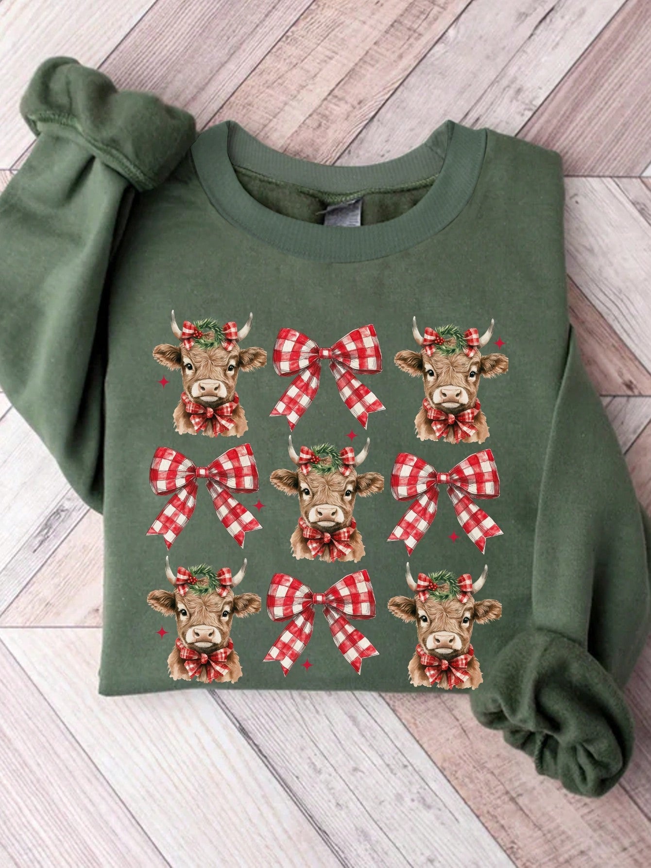 Get into the holiday spirit with our Cozy Christmas Vibes Highland Cow Bow Print Hoodie for Women. Made with ultra soft material, this hoodie features a charming cow with a bow print, perfect for spreading holiday cheer. Stay warm and stylish this season.